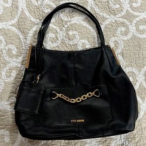 Steve Madden medium size purse, black and gold details